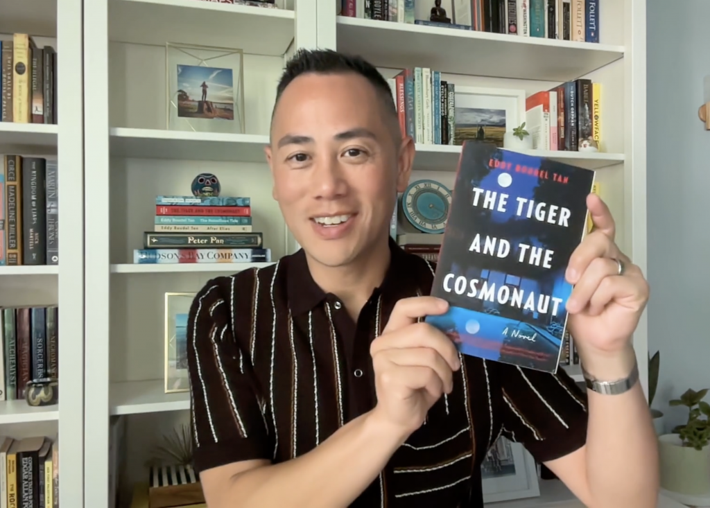 Eddy is showing his book